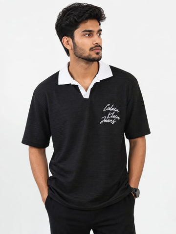Men's black drop shoulder textured polo shirt with contrast collar